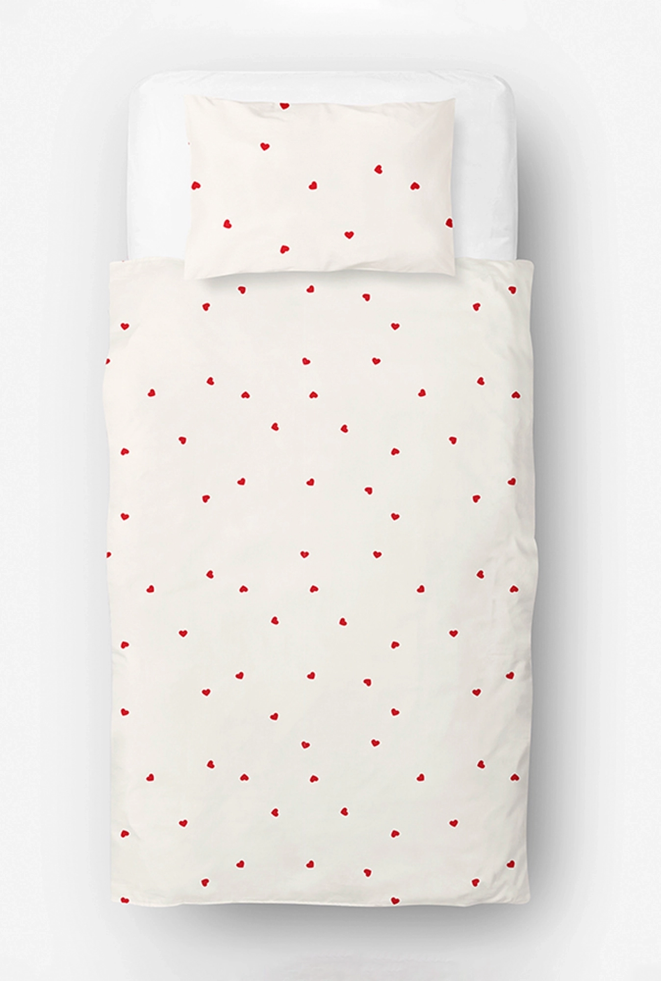 Posteljina Crvena srca na bež osnovi