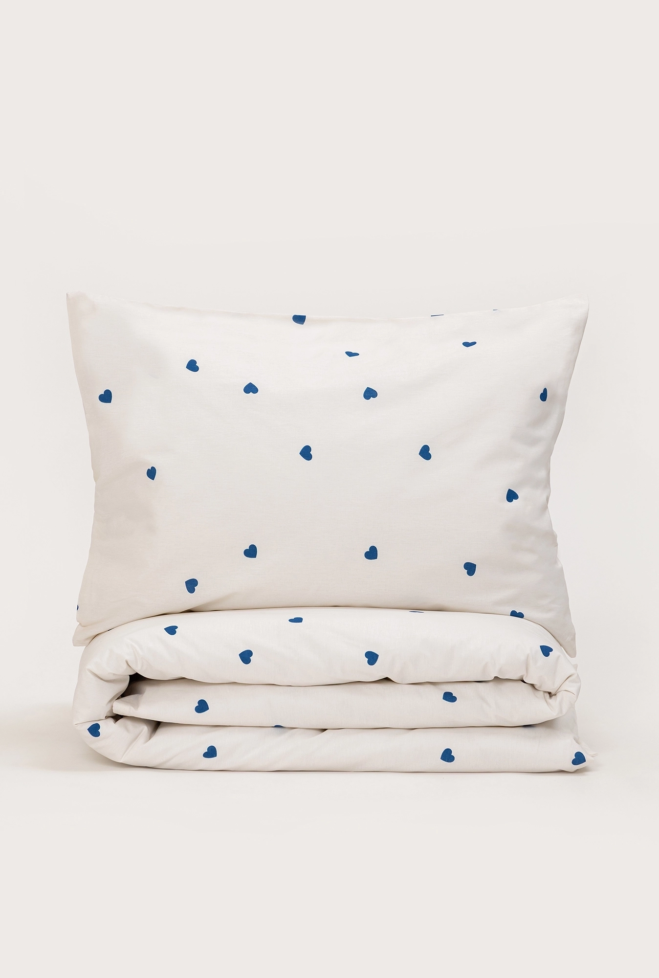 Posteljina Plava srca na bež osnovi